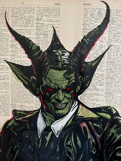 dark demon artwork ink on vintage dictionary page
