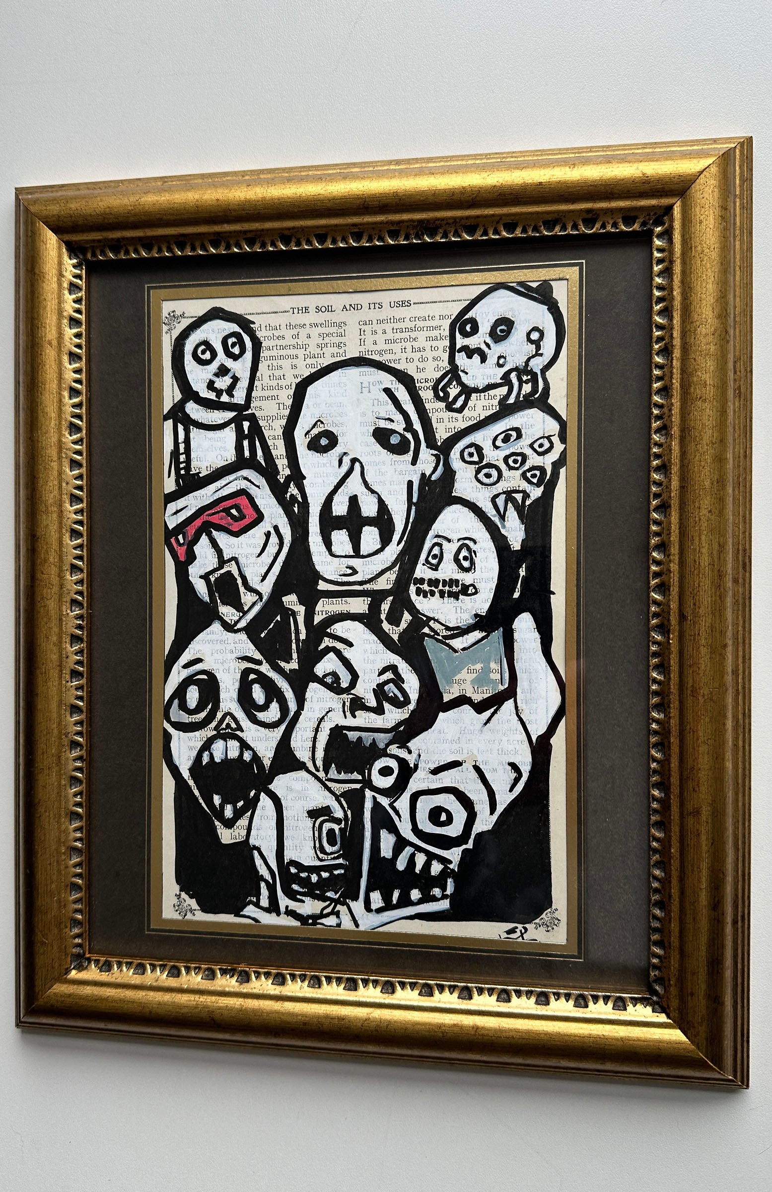 lowbrow horror art multiple faces screaming ink on vintage page