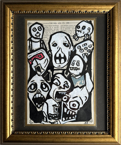 horror drawing on vintage book page screaming faces black ink style
